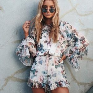 Floral ruffle trim romper